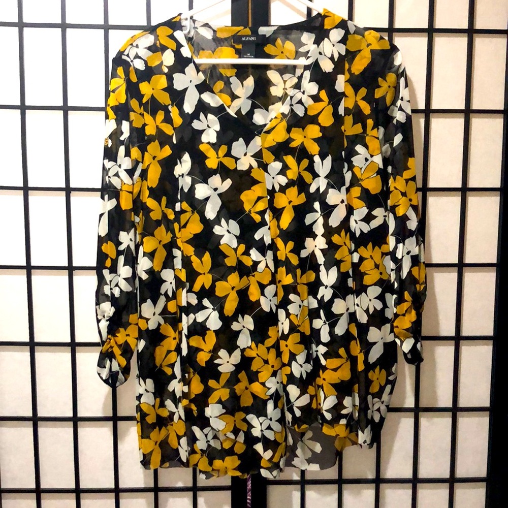 A black and yellow floral blouse